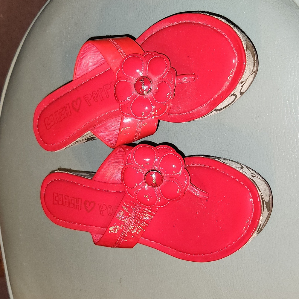 Red Beach Flip Flops with Floral Accent